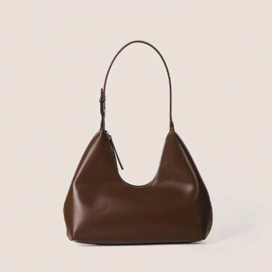 Braune Leder Halbmondtasche, tragbar, modisch, Damenhandtasche, minimalistisches Design.