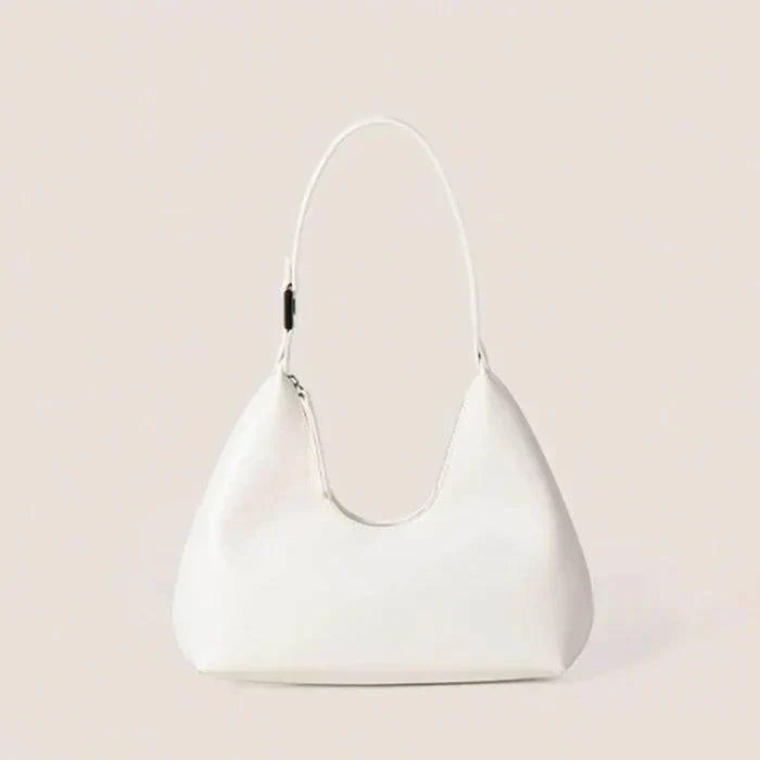 Weiße tragbare Halbmondtasche aus Leder, modisches Accessoire für Damen.