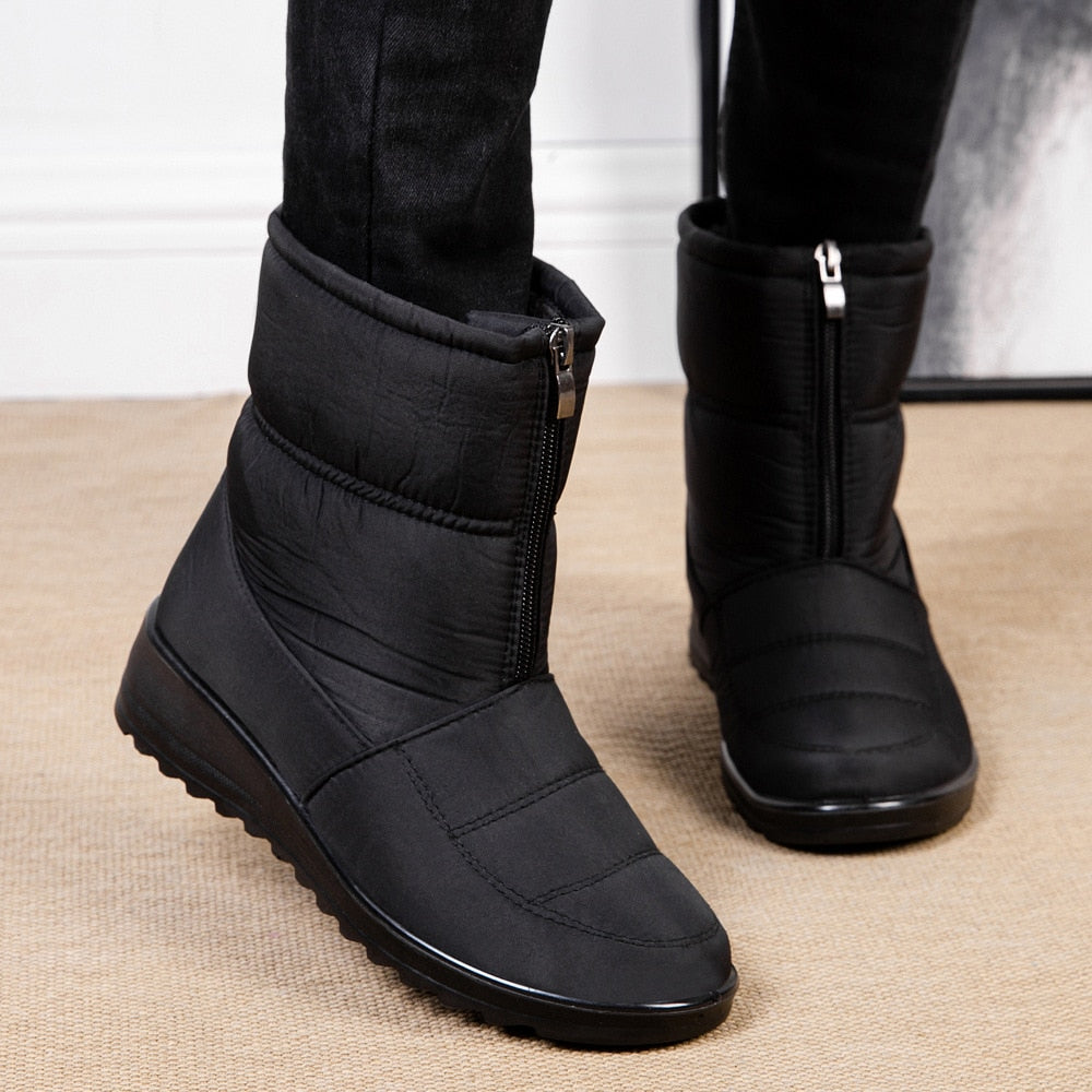 Schwarze Winterstiefel mit Reißverschluss, warm gefüttert, rutschfeste Sohle, Damenmode.