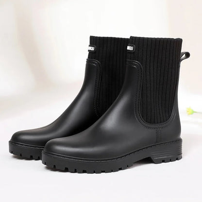 Schwarze Damenstiefel, wasserdicht, mit gerippter Sohle, modisch, bequem, Herbst/Winter.