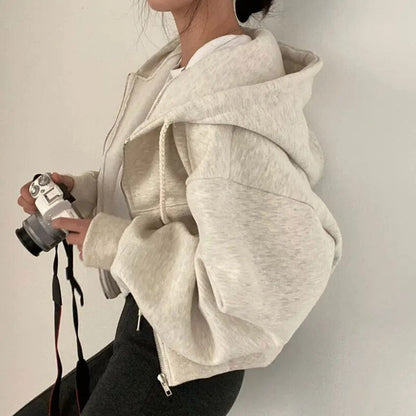 Damväst, kort modell med huva och oversized passform – Rinette