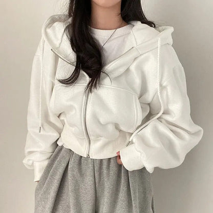 Damväst, kort modell med huva och oversized passform – Rinette