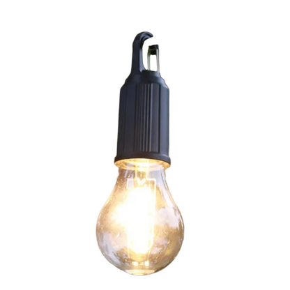 Lysande glödlampsformad lampa med svart räfflat fäste och krok, fotograferad mot vit bakgrund 2