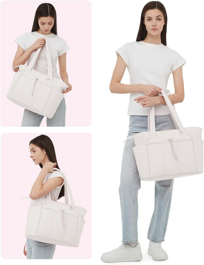 Vadderad puffer-tote med mugghållare och laptopfack för resor och arbete.
