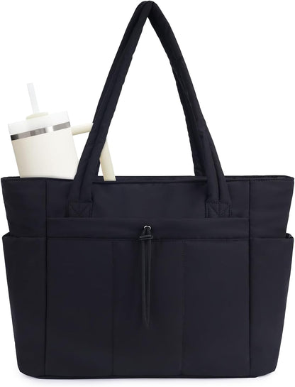 Vadderad puffer-tote med mugghållare och laptopfack för resor och arbete.