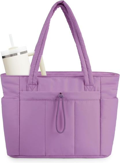 Vadderad puffer-tote med mugghållare och laptopfack för resor och arbete.