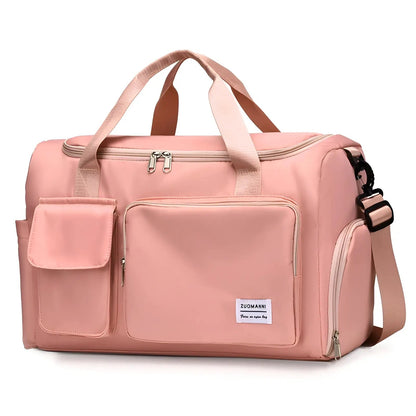Rosa Reisetasche mit Schultergurt, Reißverschlusstaschen, ideal für Reisen und Sport.