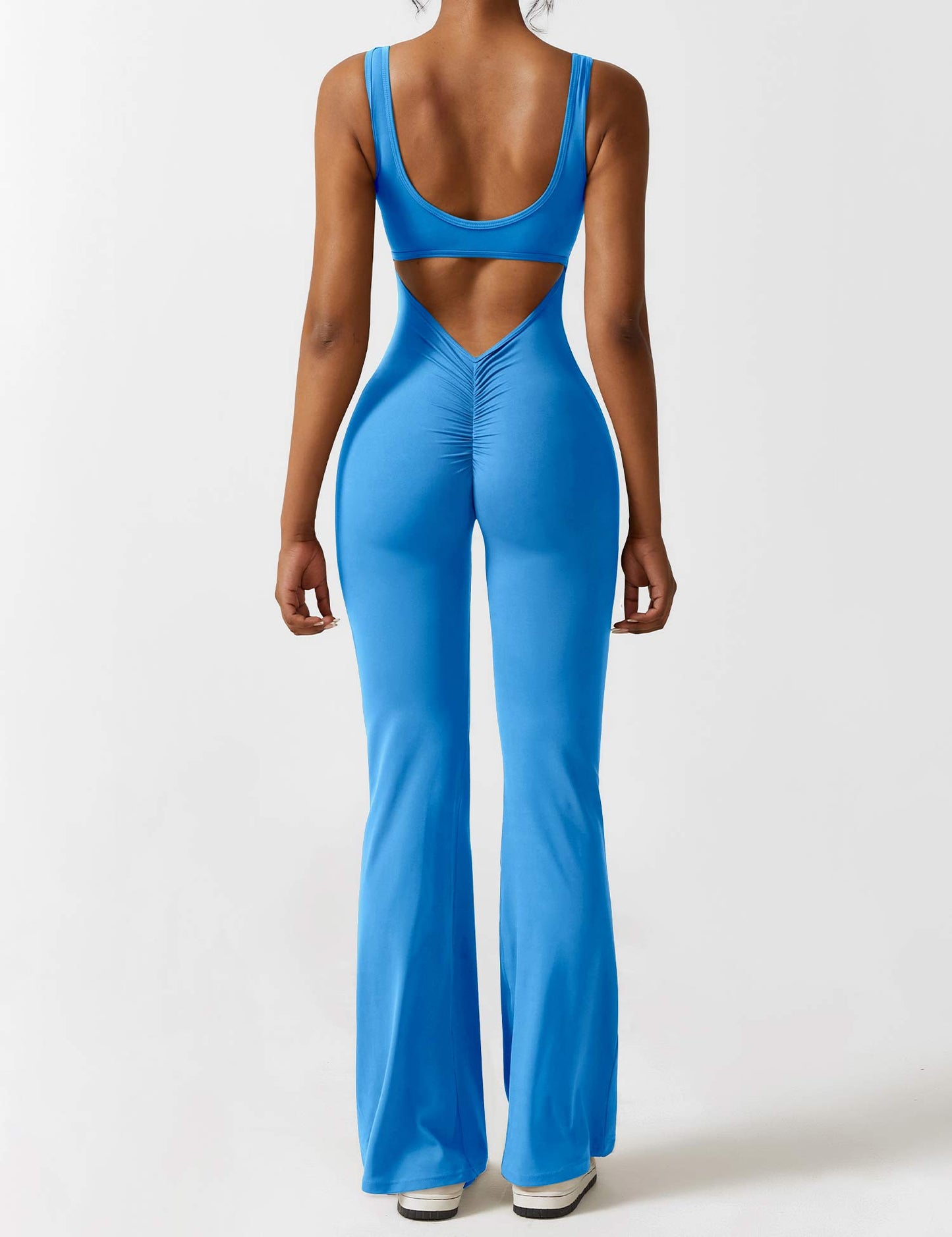 Rygglös jumpsuit med utsvängd byxa – Liv