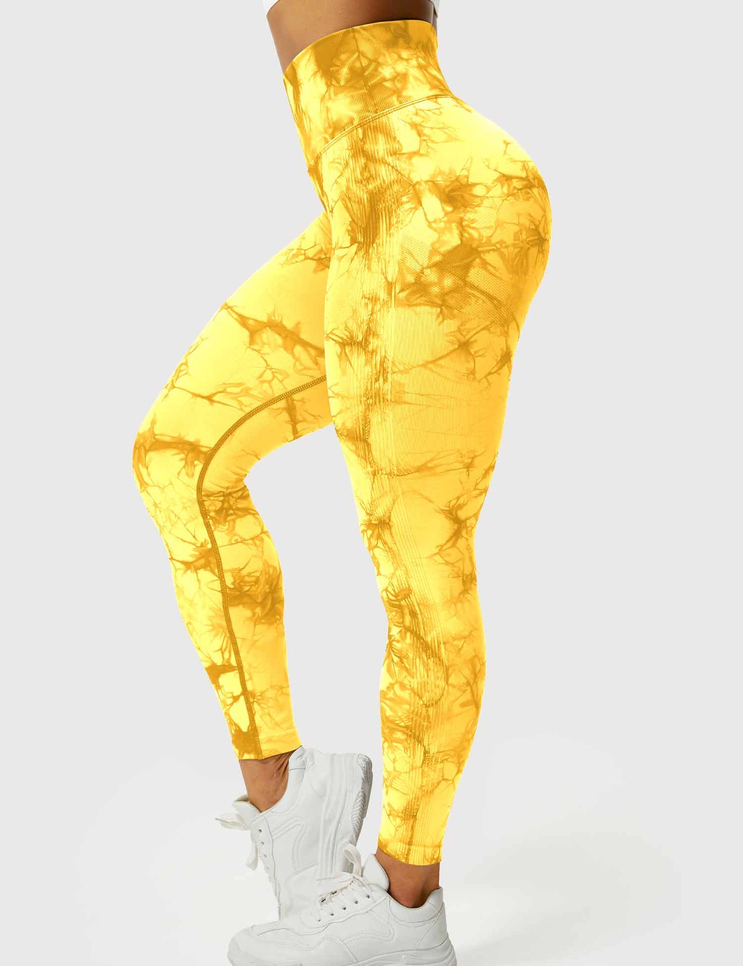 Gelbe Damen-Leggings mit Batikmuster, hoch tailliert, ideal für Sport und Freizeit.