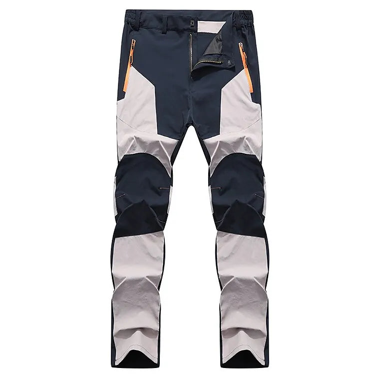 Wasserdichte Outdoor-Hose, schwarz-grau, mit Reißverschlusstaschen, ideal für Wandern und Trekking.